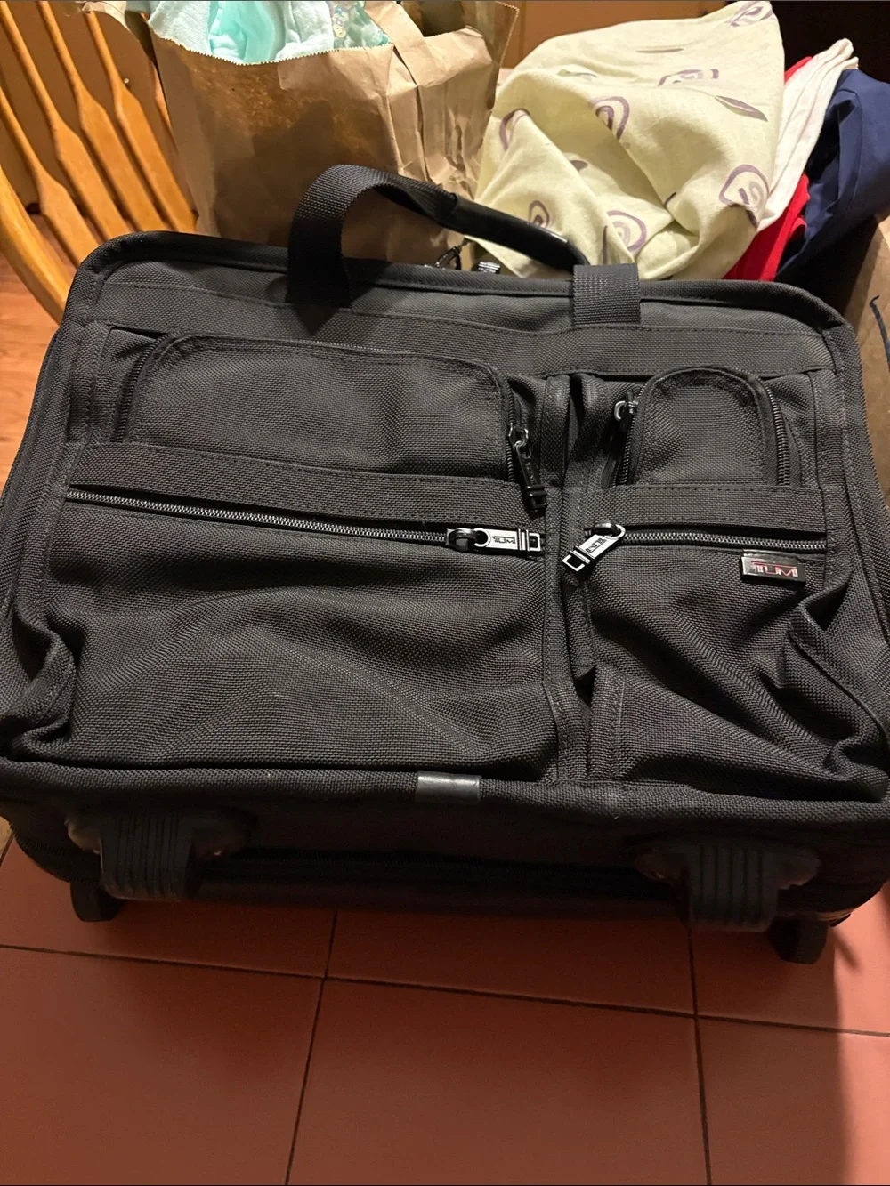 Tumi Black Rolling Travel Garment Bag with Multiple Front Pockets